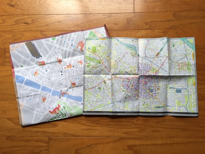 Paper maps of Florence and Milan